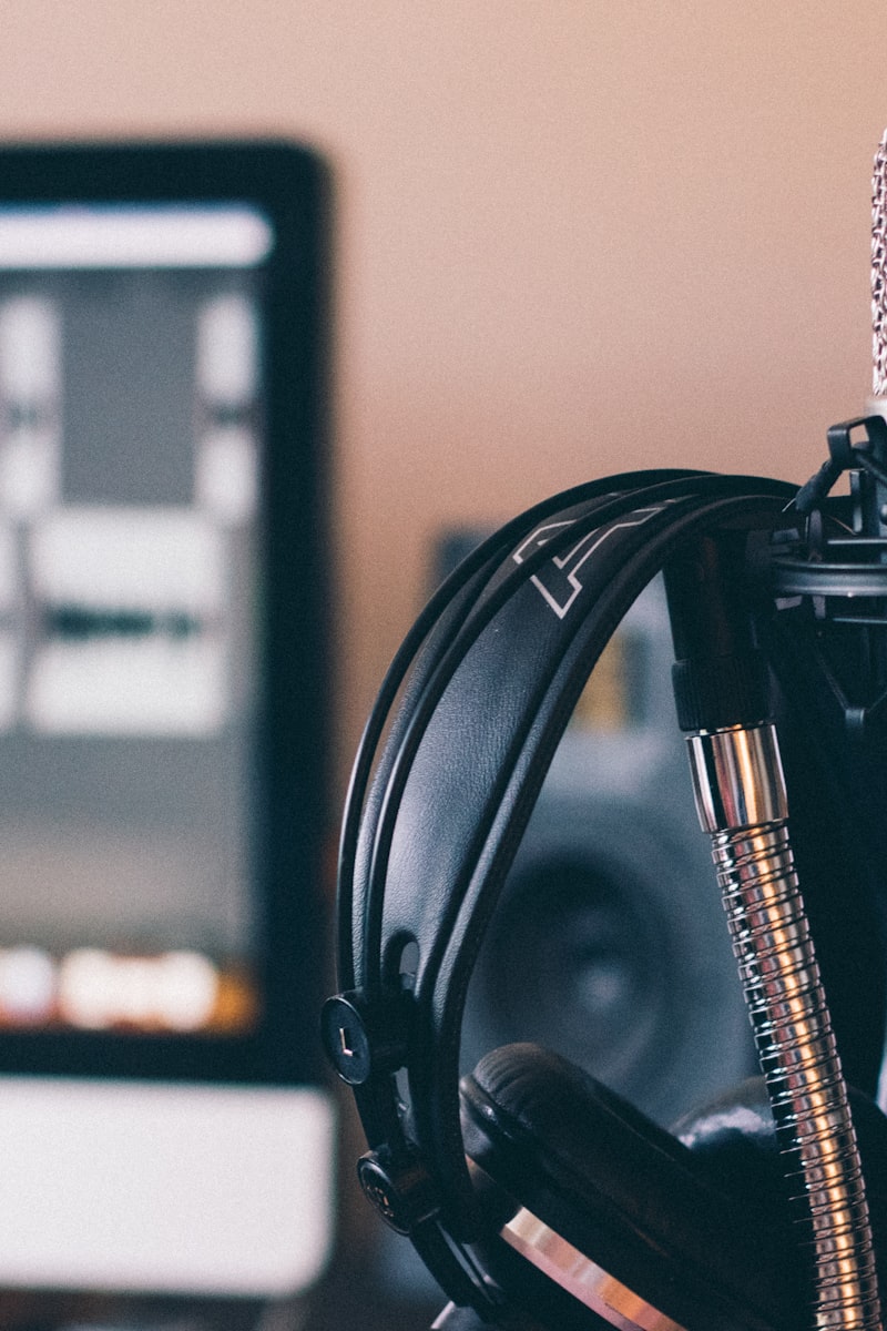 Podcast interview setup with dual microphones and acoustic treatment